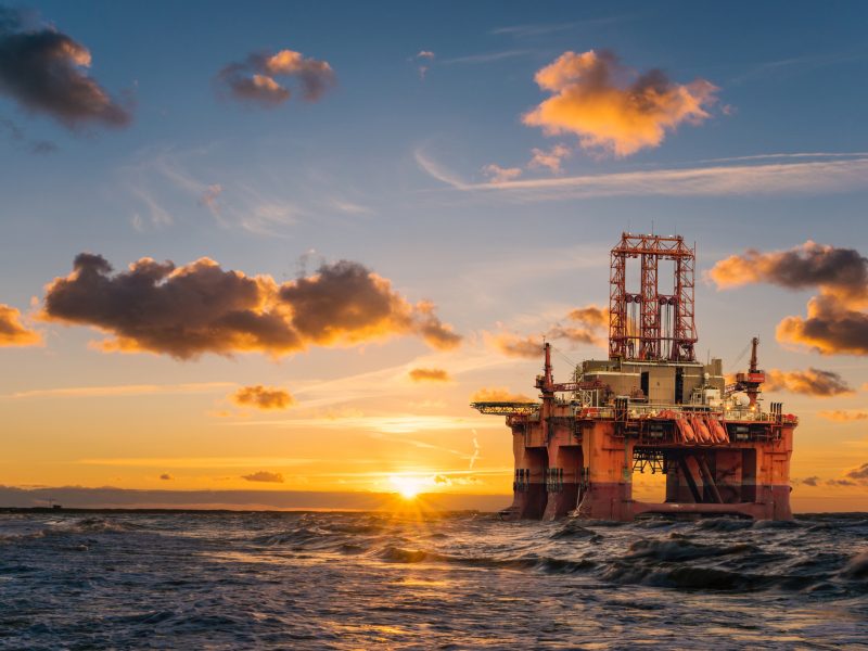 offshore oil rig at sunset